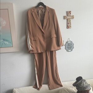 Tan women’s Suit with White Stripes